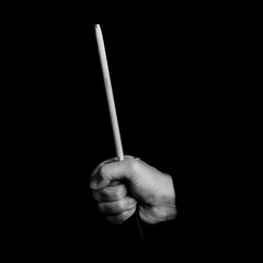 Fototapeta premium sharpener - kitchen tools in a man's hand - black and white photo 