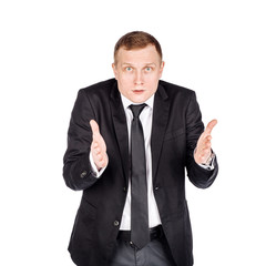 man holding two hands in front of him and shows the size on white isolated background in studio.