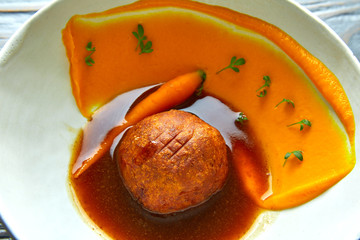 Dumpling of old cowtail with creamy carrot