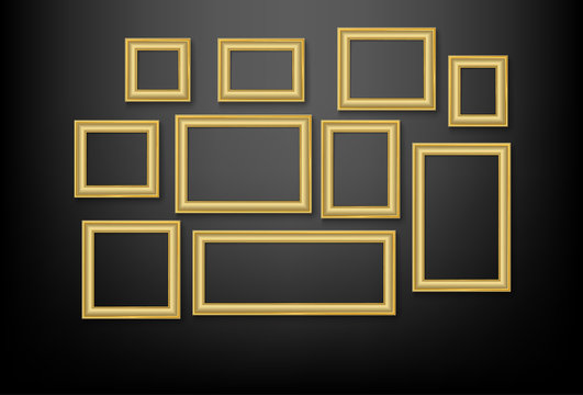 gold picture frame set on wall