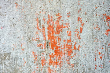 Red Peeling Paint on Concrete Wall Background.