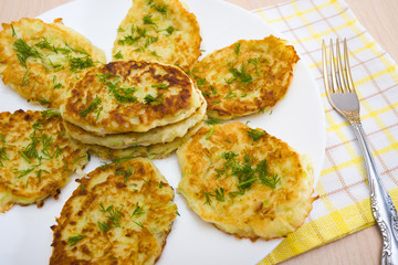 Pancakes with squash on a white plate 