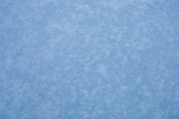 Icy Surface of a Frozen Lake in Maine, USA