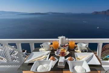 Breakfast on the hotel porch in santorini, Oia, Greece.