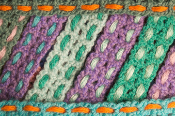 Handmade wool knitted colorful texture background