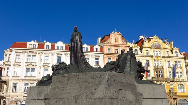 Prague Jan Hus memorial monument in Old Town Square, designed by Ladislav Saloun to honor religious martyr burned at the stake in 1415
