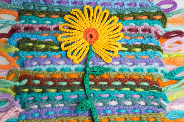 Handmade flower knitted wool colorful texture background