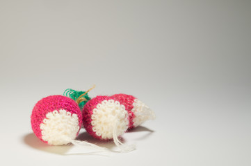 Obraz na płótnie Canvas Handmade wool knitted strawberry isolated on white