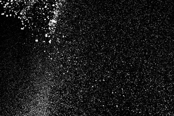 white powder explosion isolated on black background for graphic resources