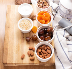 Cooking candy with dates, dried apricots and nuts, vertical horizontal, selective focus, ingredients