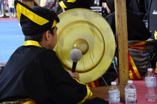 A man play gendang. Gendang is malay traditional music made from wood and buffalo leather. 