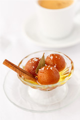 Indian Dessert Gulab Jamun with Coffee