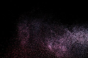 dust explosion on a black background for graphic resources.