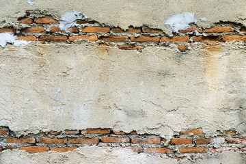 Crack old brick wall in a background