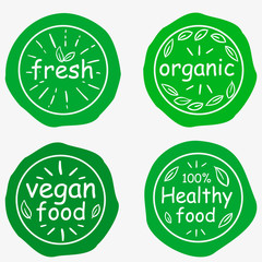 Set of four vegetarian labels with lettering. Healthy food stickers.
