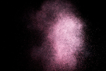 dust explosion on a black background for graphic resources.