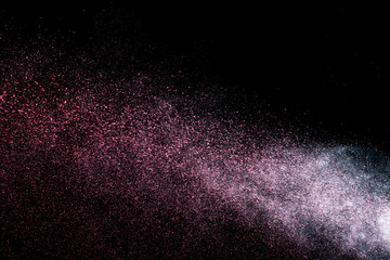 dust explosion on a black background for graphic resources.