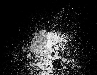 white powder explosion isolated on black background for graphic resources