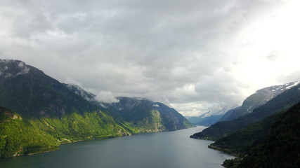Naklejka na ściany i meble View to fjord and water from drone in Norway