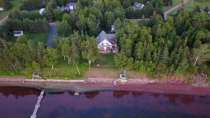 Aerial shot of house on ocean