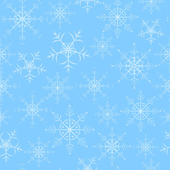 Seamless pattern, background, substrate of snowflakes on a blue background.
