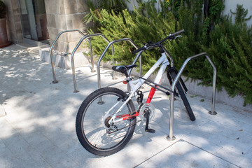 Locked bicycle at bicycle parking