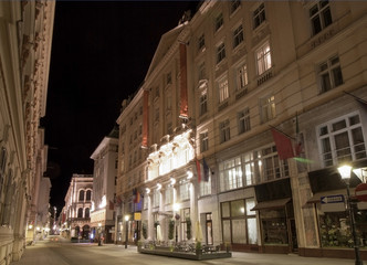 Fototapeta na wymiar Low angle view of historic illuminated building at Vienna, Austria 