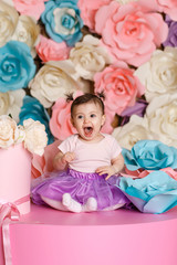 Obraz na płótnie Canvas Cute little girl celebrate her first birthday
