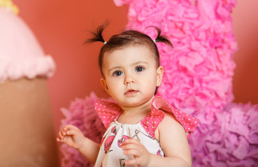 Fototapeta premium Cute little girl celebrate her first birthday