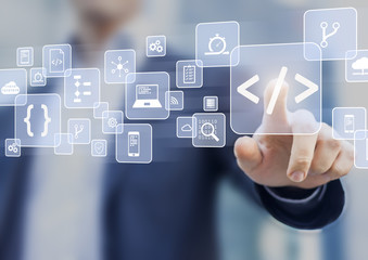 Coding concept with software developer touching code symbol and icons