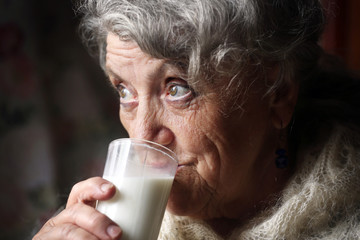 Grandmother drinks milk