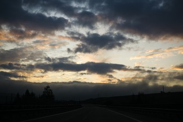 Misty morning sunrise on the road. Slovakia