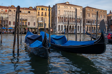 Fototapeta na wymiar Gondola's sit along the Grand Canal in Venice