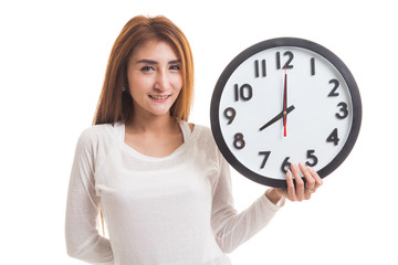 Young Asian woman with a clock.