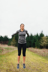 Fototapeta na wymiar Running Women Jogging in Country