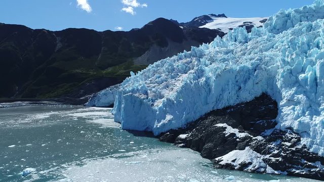 Arial 4k shots of a glacier and it's surroundings in Alaska