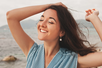 close up Happy woman near ocean, summer vacation