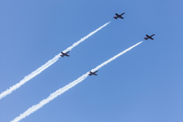 Jet planes flying against a clear, blue, summer sky. Reach for the sky!