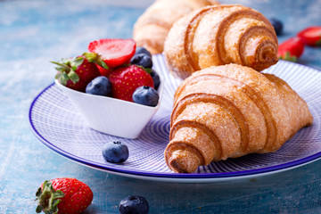  Breakfast Continental  with Fresh  Croissants and ripe Berries .Delicious Baking with Berry Jam