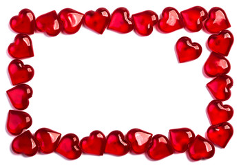 Square frame of glass hearts on a white background