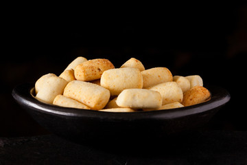 Traditional snack from Colombia called achira on black background