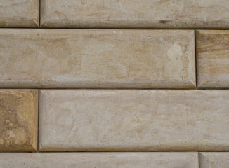 polished sandstone beige brick wall background