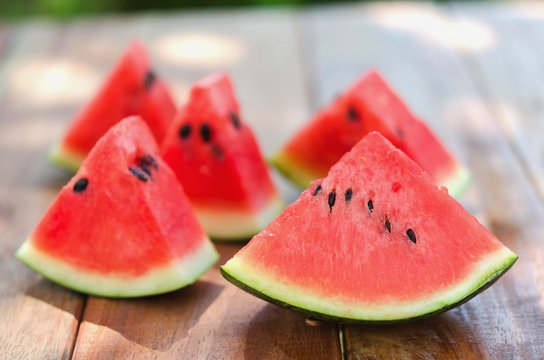 fresh slice of watermelon on woods background
