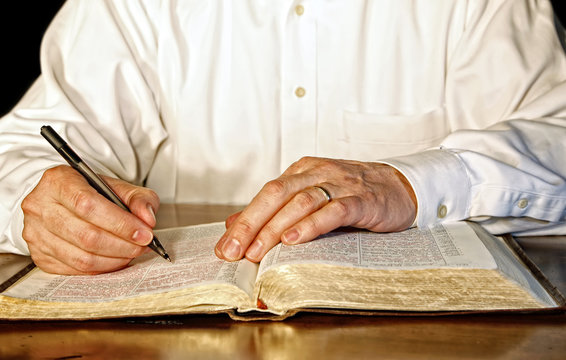 Businessman Studying the Bible