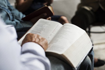 Group of christianity people reading bible together