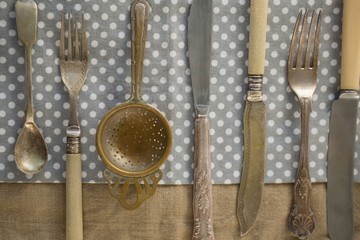 Directly above shot of cutlery arranged side by side