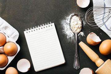 Backing background with eggs and flour