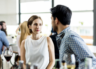 People having meal together in the restaurant