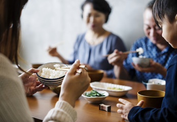 Japanese family dining together with happiness