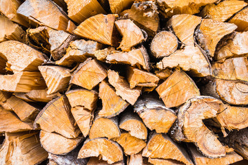 Stack of firewood for rough texture background